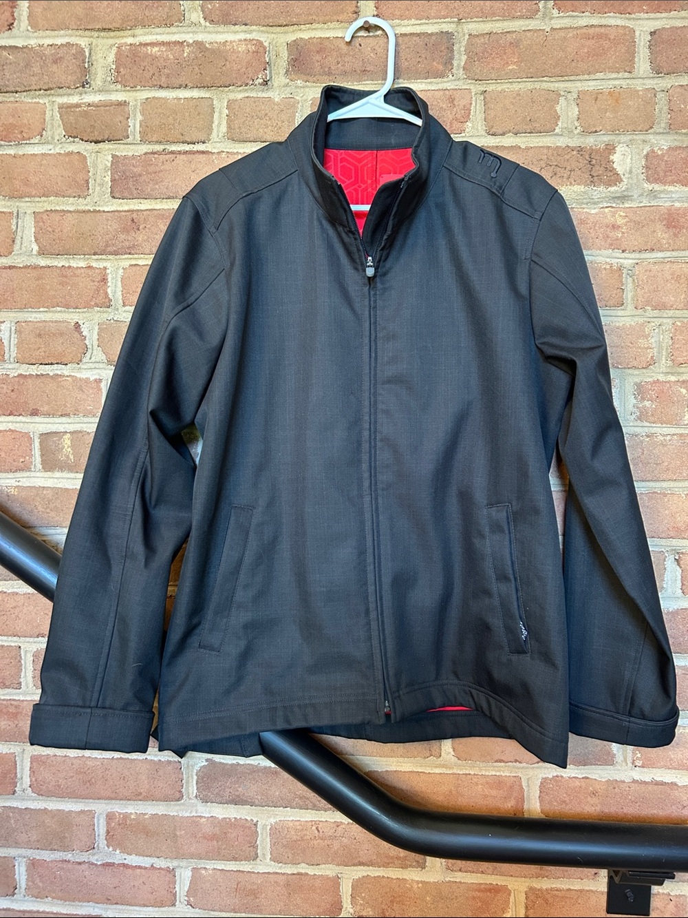 Novara Black Lightweight Zip Jacket with Red Interior Accents